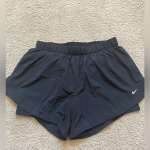 Nike shorts with built in compression shorts.